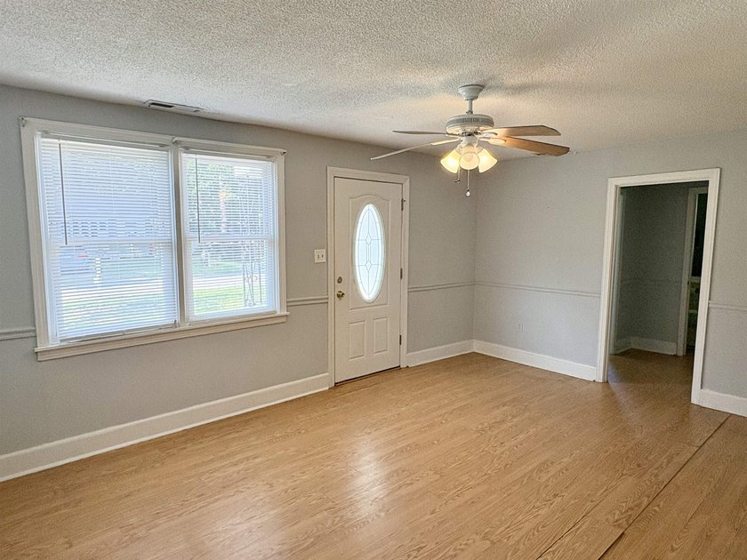 This charming 3-bedroom, 1-bath home is nestled in the desirable - photo 6