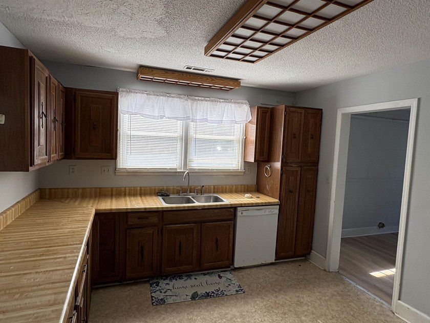 This charming 3-bedroom, 1-bath home is nestled in the desirable - photo 8