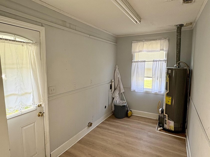 This charming 3-bedroom, 1-bath home is nestled in the desirable - photo 9
