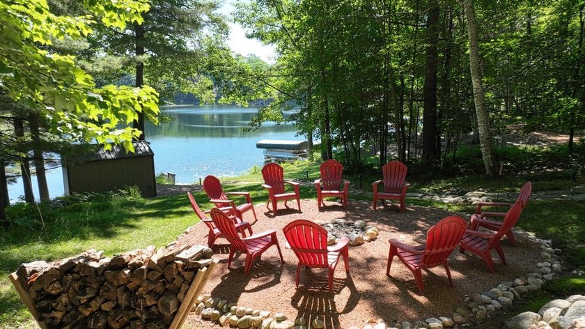 BIRD LAKE CHARMER. Tucked in the woods, this year-round home - photo 4