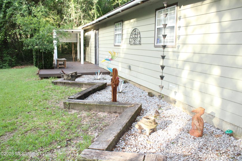 This home features an open floor plan, lots of shade from the - photo 12
