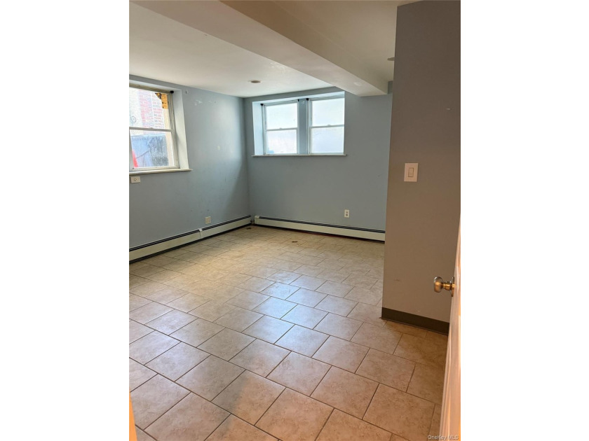 Beautiful and well-maintained legal 3-family detached home in - photo 8