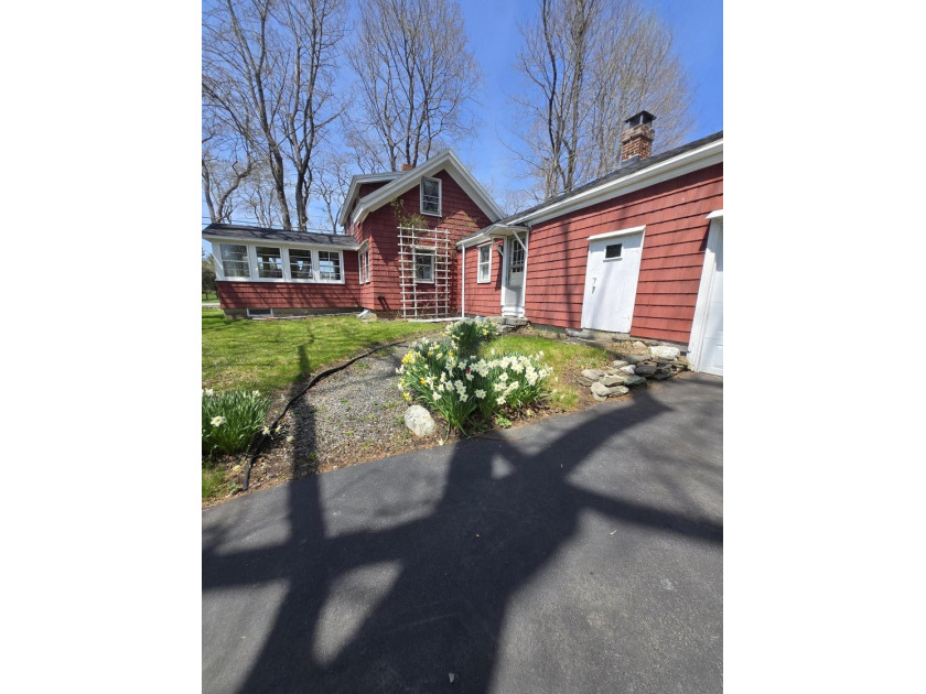 This unique cottage-style property in Falmouth, Maine, is a rare - photo 29