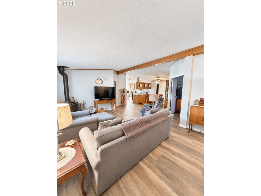 Experience tranquility at Giadanj Lake Estates with this updated - photo 5