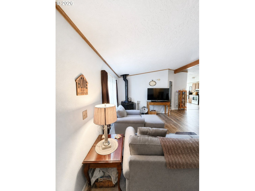 Experience tranquility at Giadanj Lake Estates with this updated - photo 8