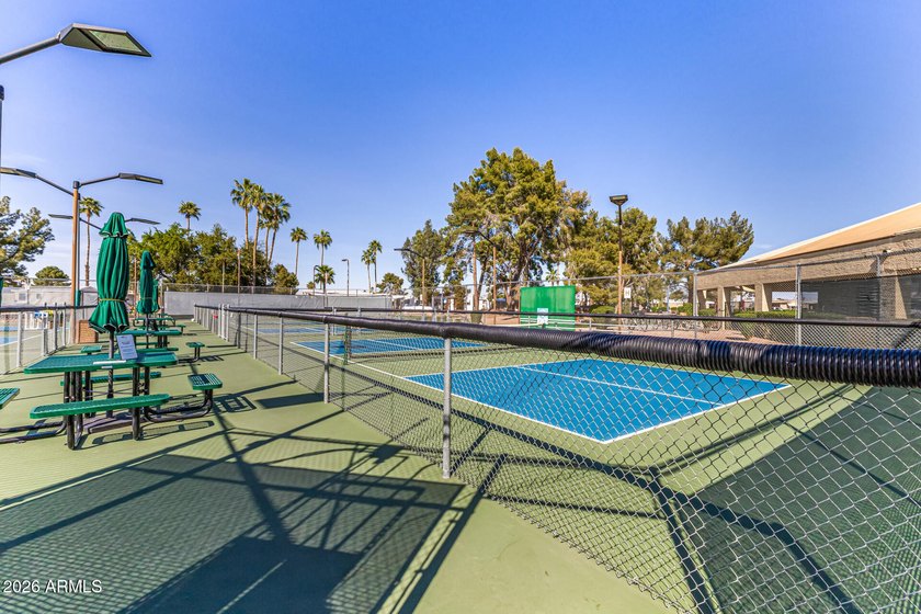 Tucked within the welcoming, resort-style community of Paradise - photo 17