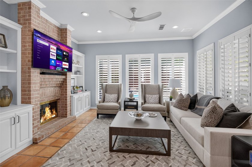 Nestled beneath mature shade trees in the prestigious gated - photo 12