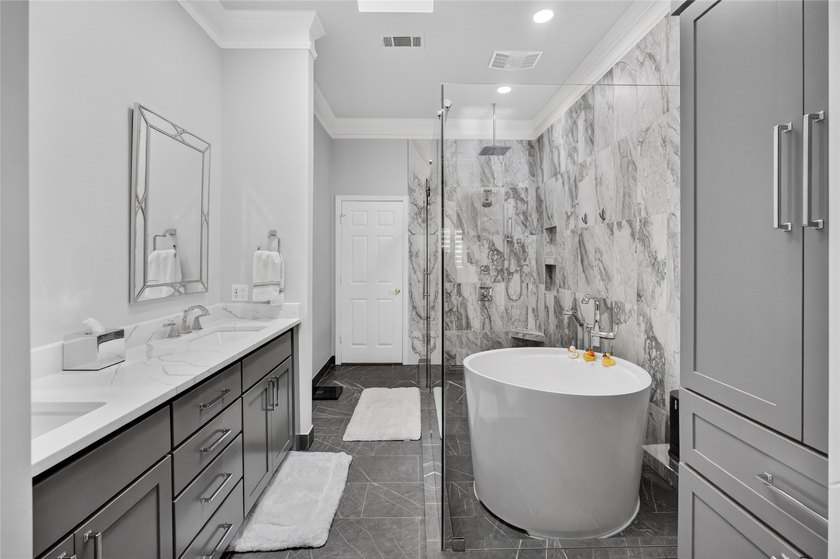 Nestled beneath mature shade trees in the prestigious gated - photo 20