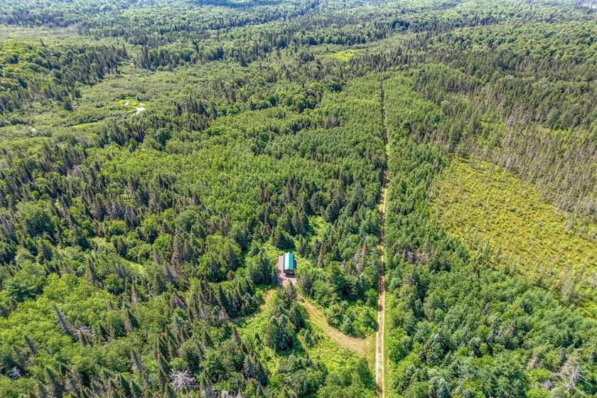 This 120-acre property is situated within the Ottawa National - photo 5