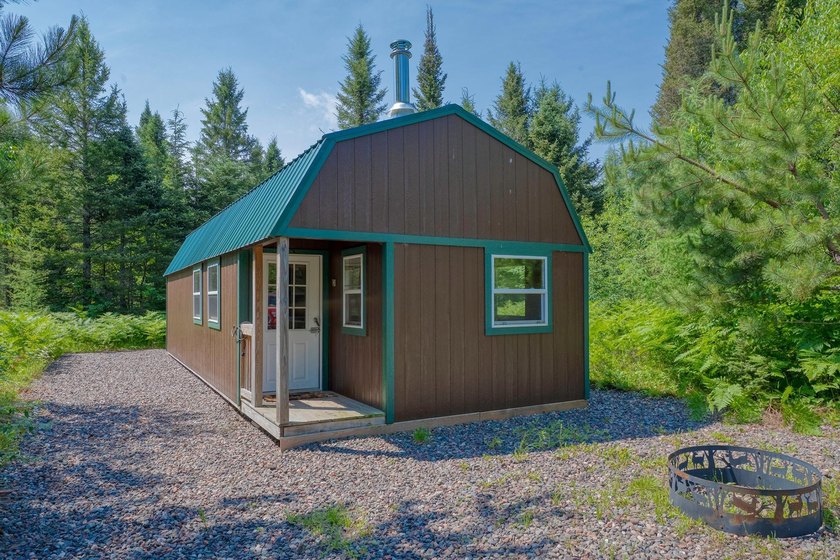 This 120-acre property is situated within the Ottawa National - photo 6