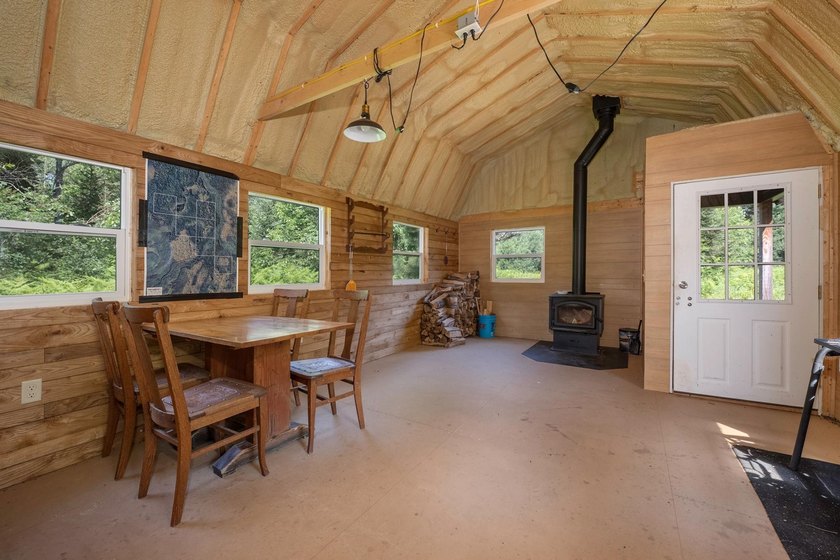 This 120-acre property is situated within the Ottawa National - photo 7