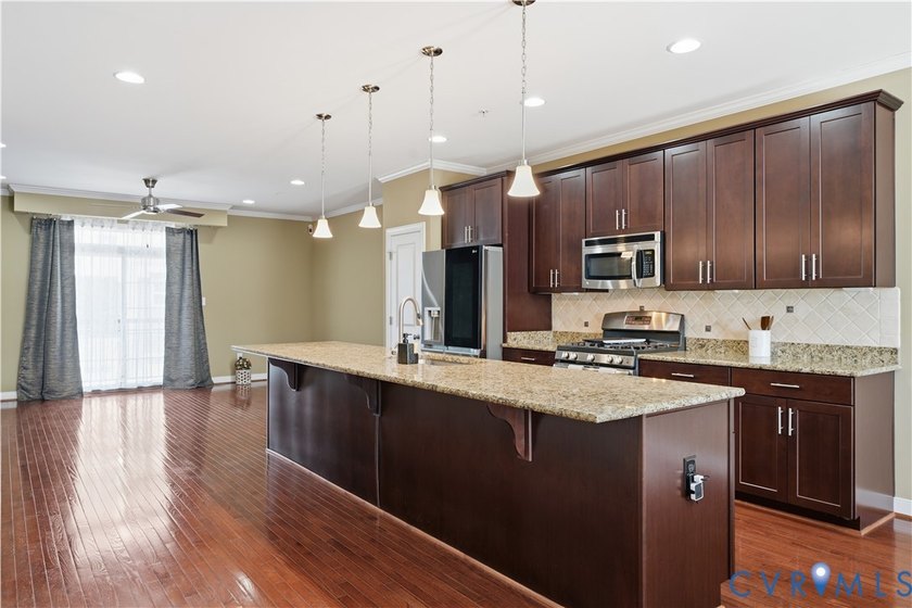 This elegant 4-story brick townhome in New Town Williamsburg - photo 4