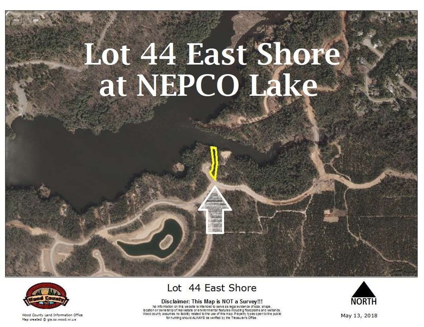 Over 60' of frontage on beautiful NEPCO Lake. This wooded lot - photo 5
