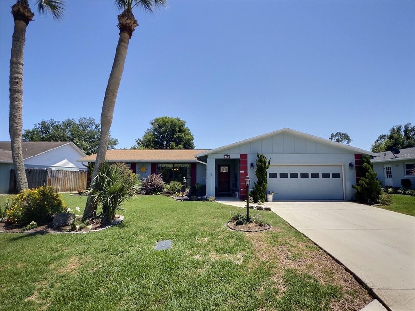 We are pleased to present this dual-primary-bedroom home located - photo 2