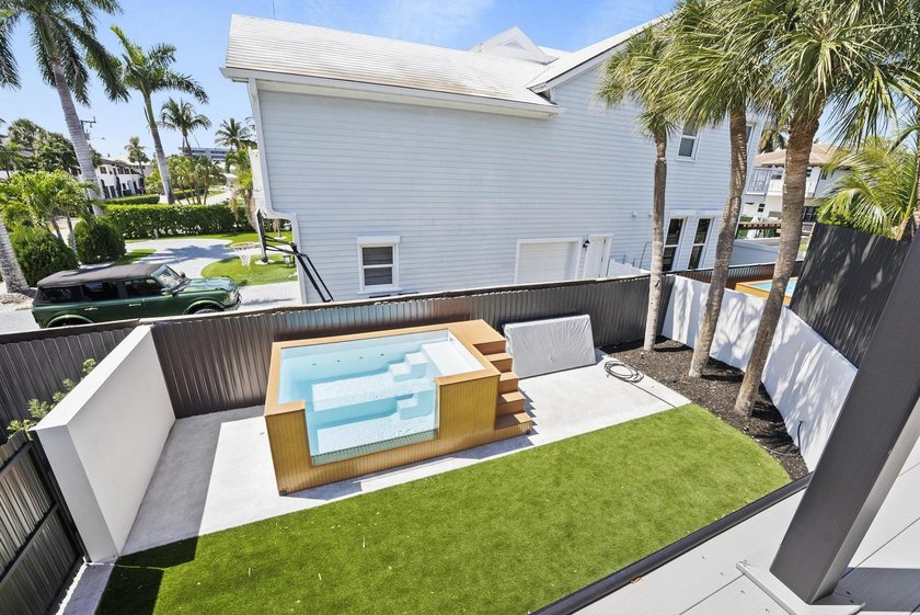 Coastal luxury meets modern perfection in this absolutely - photo 30