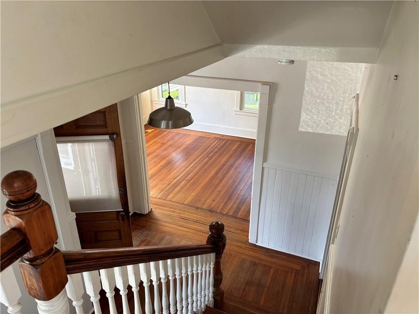 A true diamond in the rough, this classic Newport Dutch Colonial - photo 4
