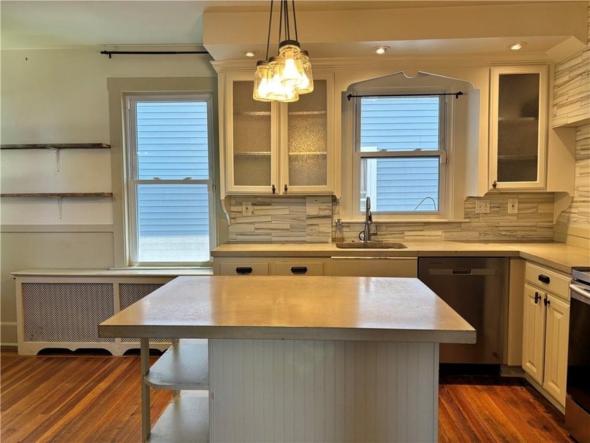 A true diamond in the rough, this classic Newport Dutch Colonial - photo 10