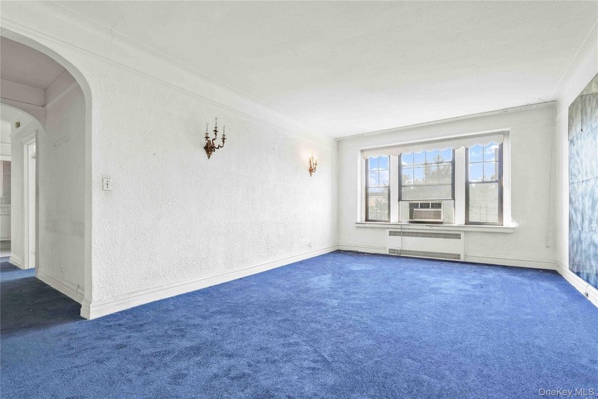 Welcome to 109-14 Ascan Avenue, Unit 5A, a bright and inviting - photo 9