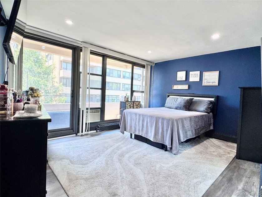 Move right in! This bright, spacious, renovated 5th-floor corner - photo 5
