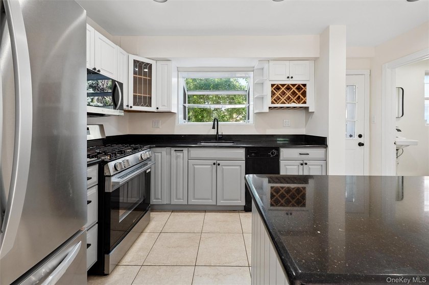 This versatile B3 two-family home has been thoughtfully - photo 3