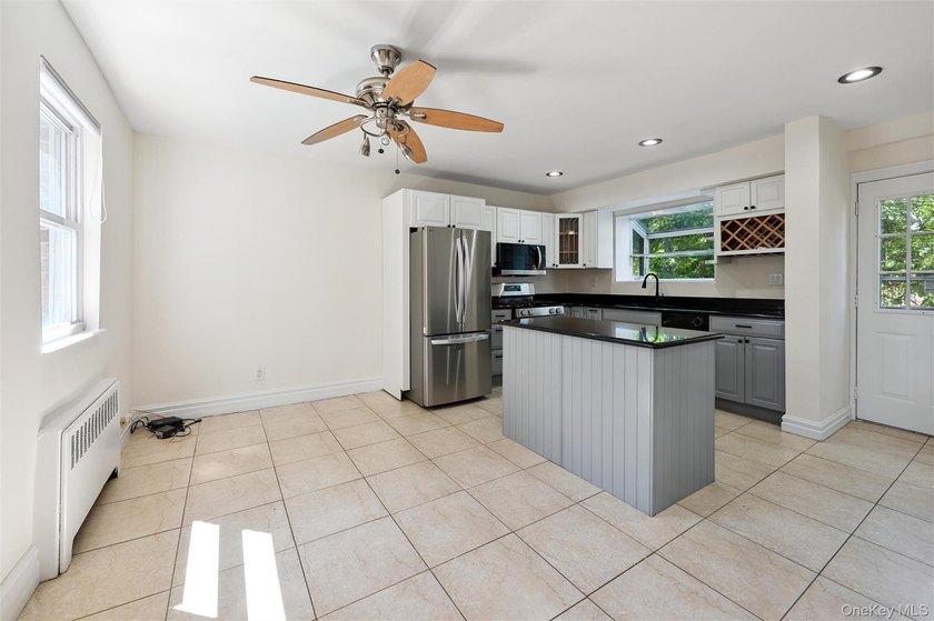 This versatile B3 two-family home has been thoughtfully - photo 5