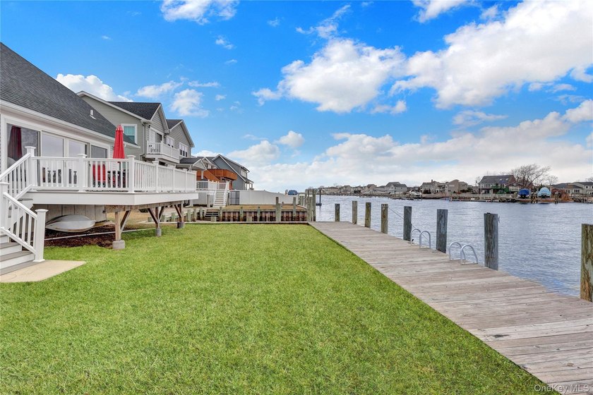 Set across a double parcel at the end of a quiet waterfront - photo 32