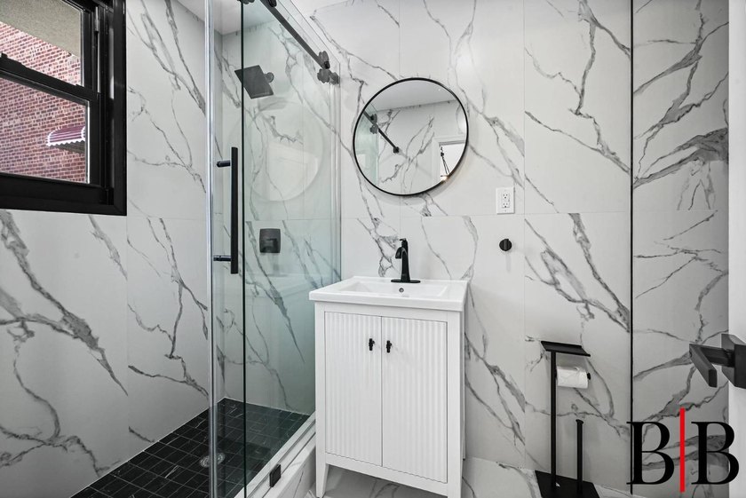 We are most pleased to present this amazing fully renovated 4 - photo 11
