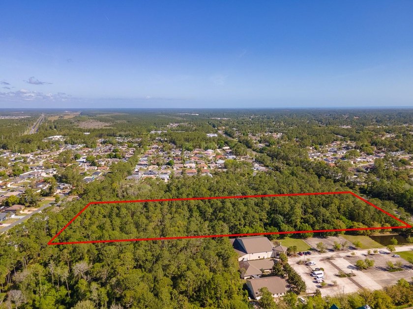 Excellent opportunity to own this 8.8 acre commercial parcel on - photo 8