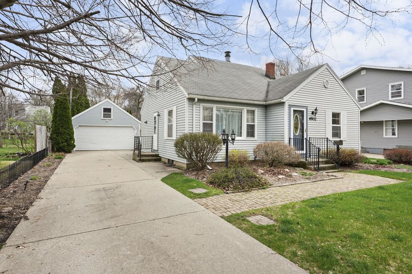 Welcome home to this charming 1 1/2-story home in the heart of - photo 2