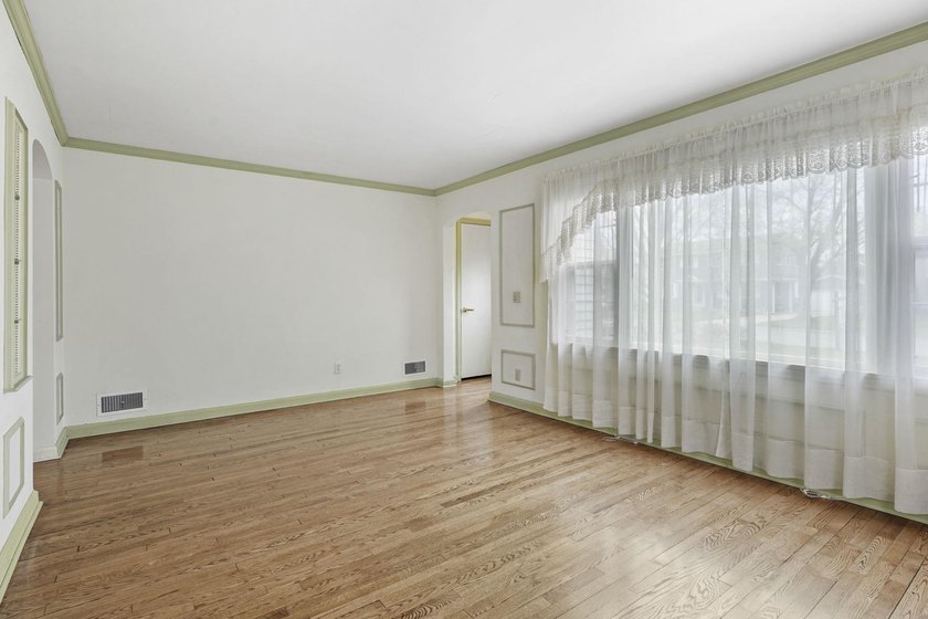 Welcome home to this charming 1 1/2-story home in the heart of - photo 6