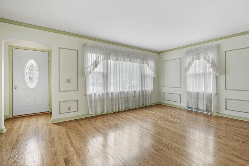 Welcome home to this charming 1 1/2-story home in the heart of - photo 7