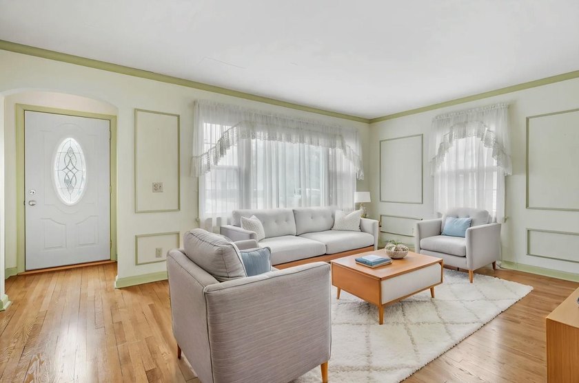 Welcome home to this charming 1 1/2-story home in the heart of - photo 8