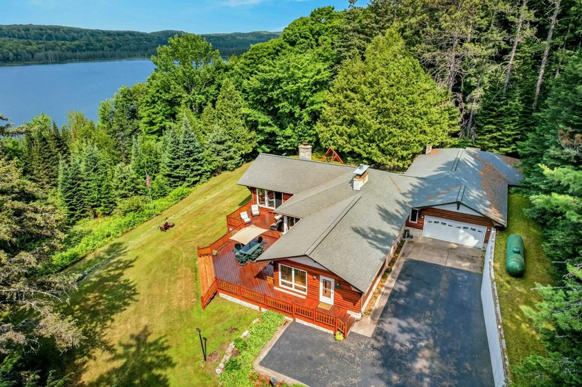 One-of-a-kind Northwoods home offering exceptional privacy on a - photo 2