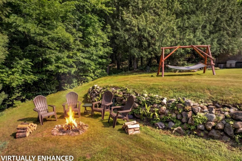 One-of-a-kind Northwoods home offering exceptional privacy on a - photo 5