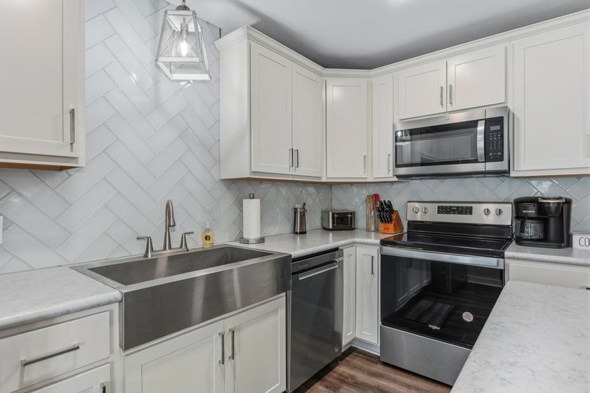 Built in 2023, this lakefront condo at Green Turtle Bay Resort &amp; - photo 8
