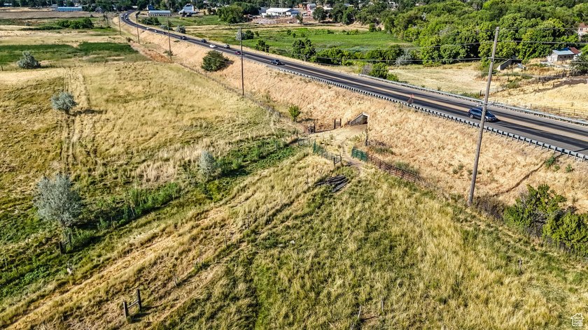 This rare 6.63-acre property within city limits features a - photo 20