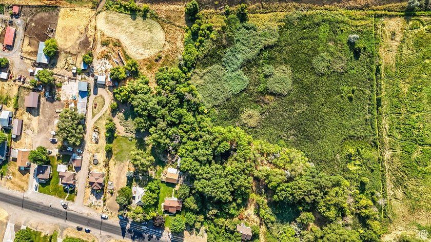 This rare 6.63-acre property within city limits features a - photo 29
