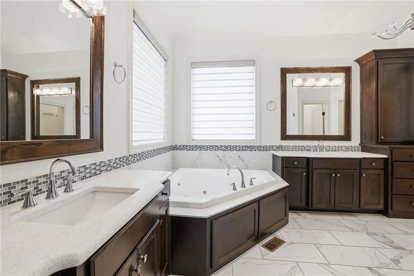 Welcome home to this beautifully designed reverse 1.5-story - photo 34