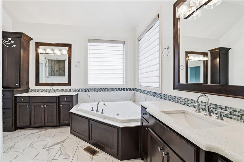Welcome home to this beautifully designed reverse 1.5-story - photo 35