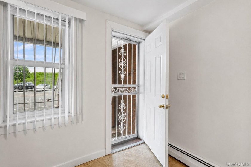 Welcome to 1166 Bergen Avenue, a rare three-family opportunity - photo 4