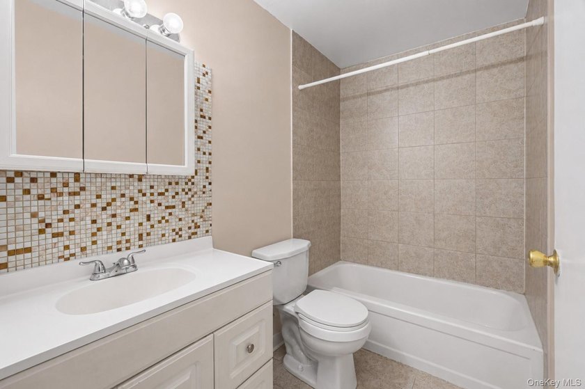Welcome to 1166 Bergen Avenue, a rare three-family opportunity - photo 8
