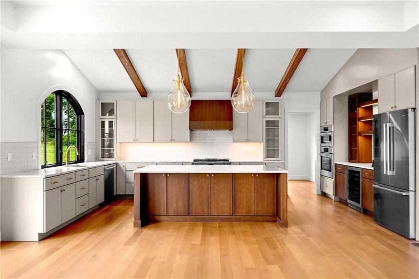 This stunning new-construction home seamlessly balances - photo 6
