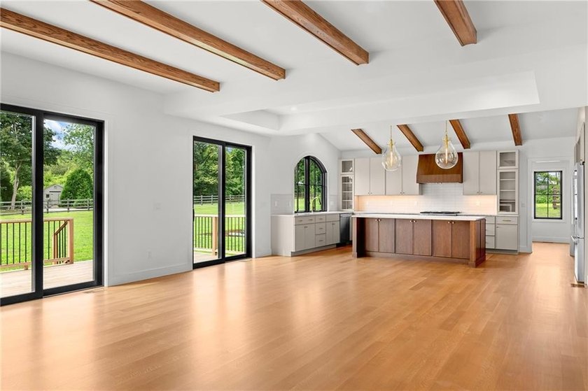 This stunning new-construction home seamlessly balances - photo 9