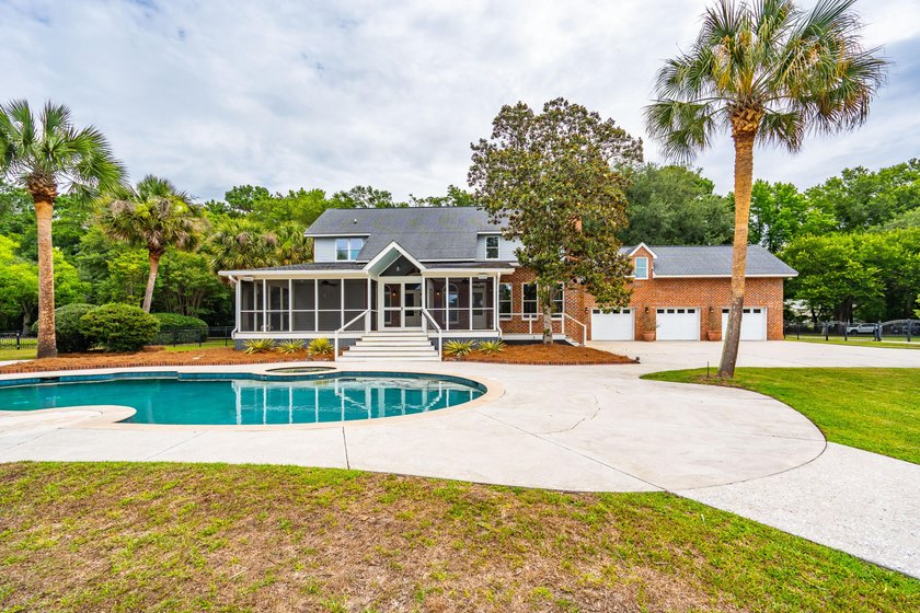 Set on 2.3 private acres overlooking the marsh, 5038 Stono - photo 3