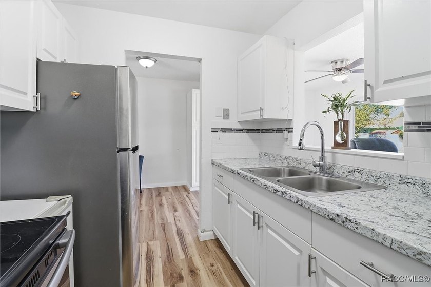 * Short Sale * This inviting 2-bedroom, 1.5-bath home is a - photo 13