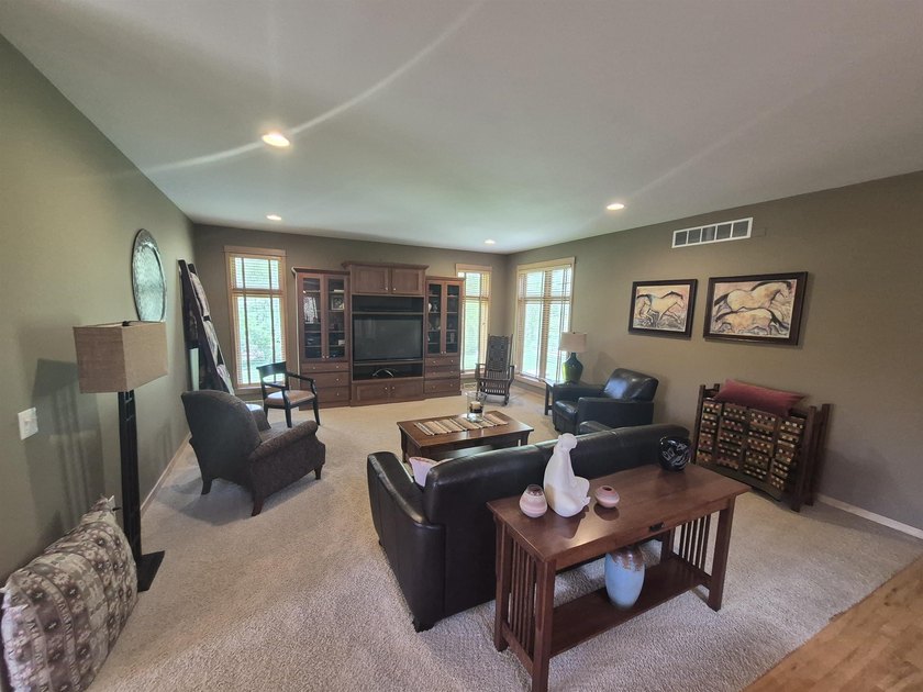 GORGEOUS COUNTRY FREE STANDING CONDO ON WOODED LOT W/WATER - photo 15