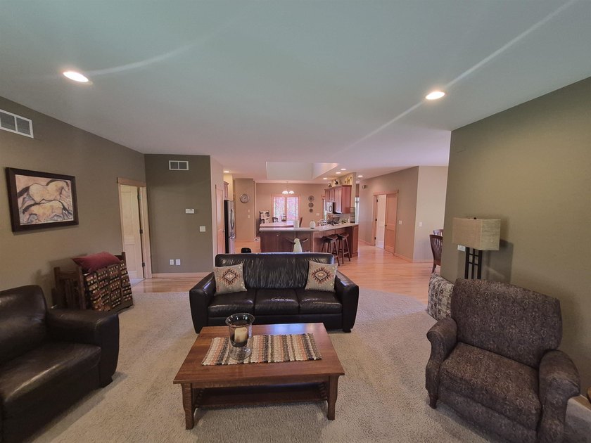 GORGEOUS COUNTRY FREE STANDING CONDO ON WOODED LOT W/WATER - photo 18