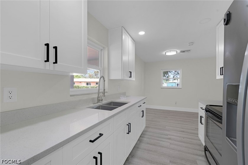 Welcome to 4800 Zana Dr in Fort Myers, a beautifully updated 3 - photo 3