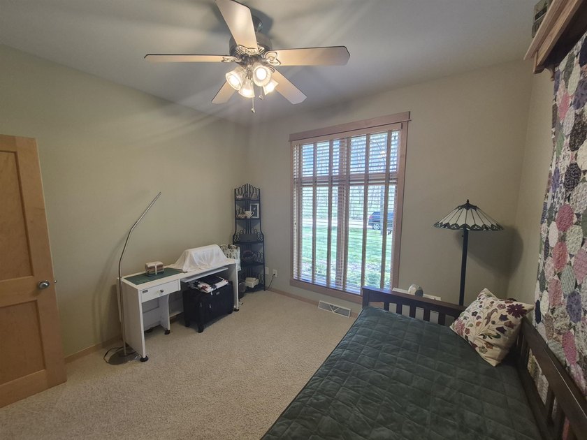 GORGEOUS COUNTRY FREE STANDING CONDO ON WOODED LOT W/WATER - photo 25