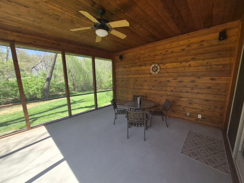 GORGEOUS COUNTRY FREE STANDING CONDO ON WOODED LOT W/WATER - photo 36